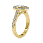 Profile side view of a 2 CT pear lab diamond halo ring with pave band in yellow gold.