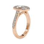 Angled side view of a 2 CT pear lab grown diamond halo engagement ring in rose gold.