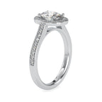 Side profile view of a 2 CT oval lab grown diamond halo engagement ring with pave band in white gold.