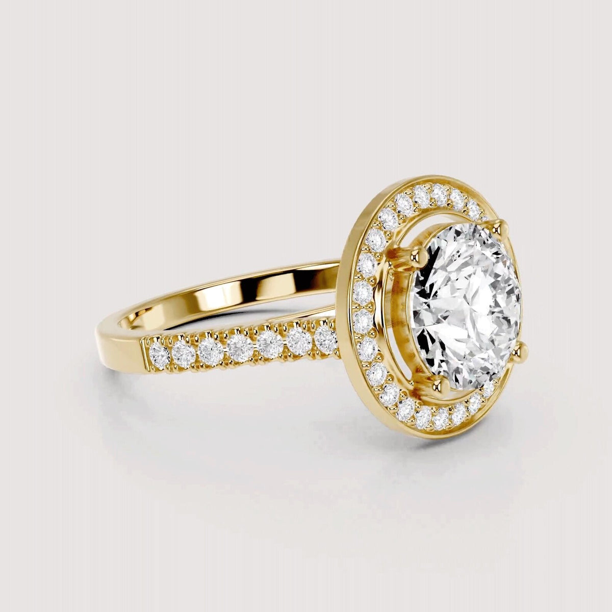 Angled front view of a 4 CT round cut lab diamond halo engagement ring in yellow gold.