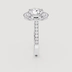 Side profile view of a 4 CT round lab grown diamond halo engagement ring in white gold.