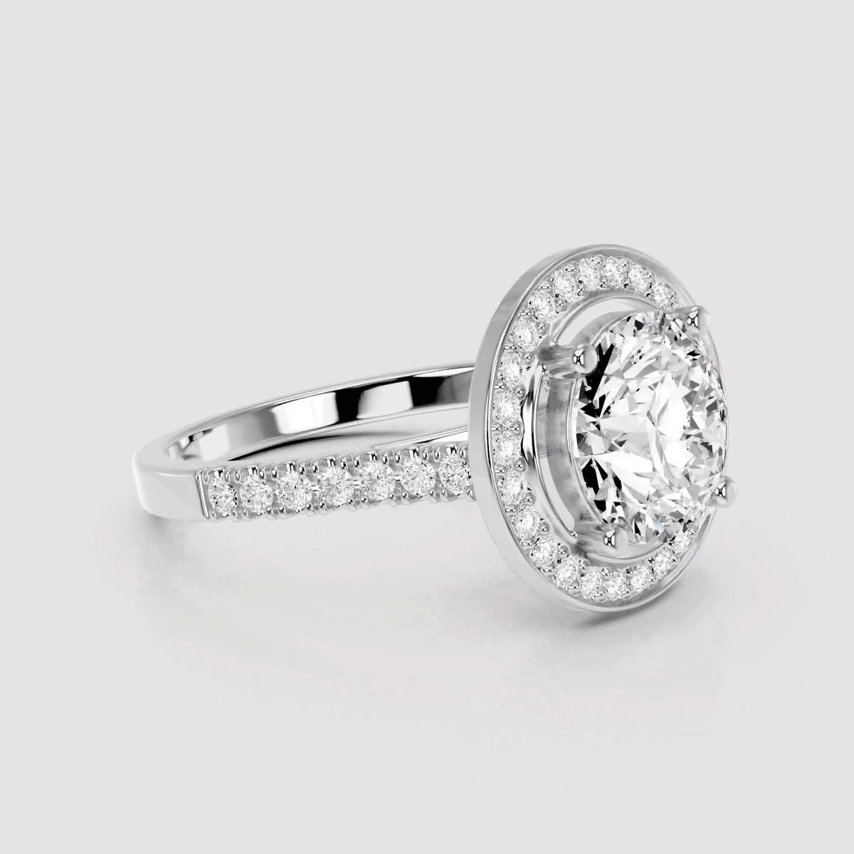 Front angled perspective of a 4 CT round cut lab grown diamond halo ring in white gold.
