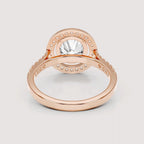 Under-gallery perspective of a 4 CT round cut lab grown diamond halo ring in rose gold.