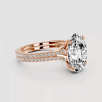 Close up side view of 4 Carat Oval Lab Grown Diamond Ring in Rose Gold with Double Row Pavé Shank