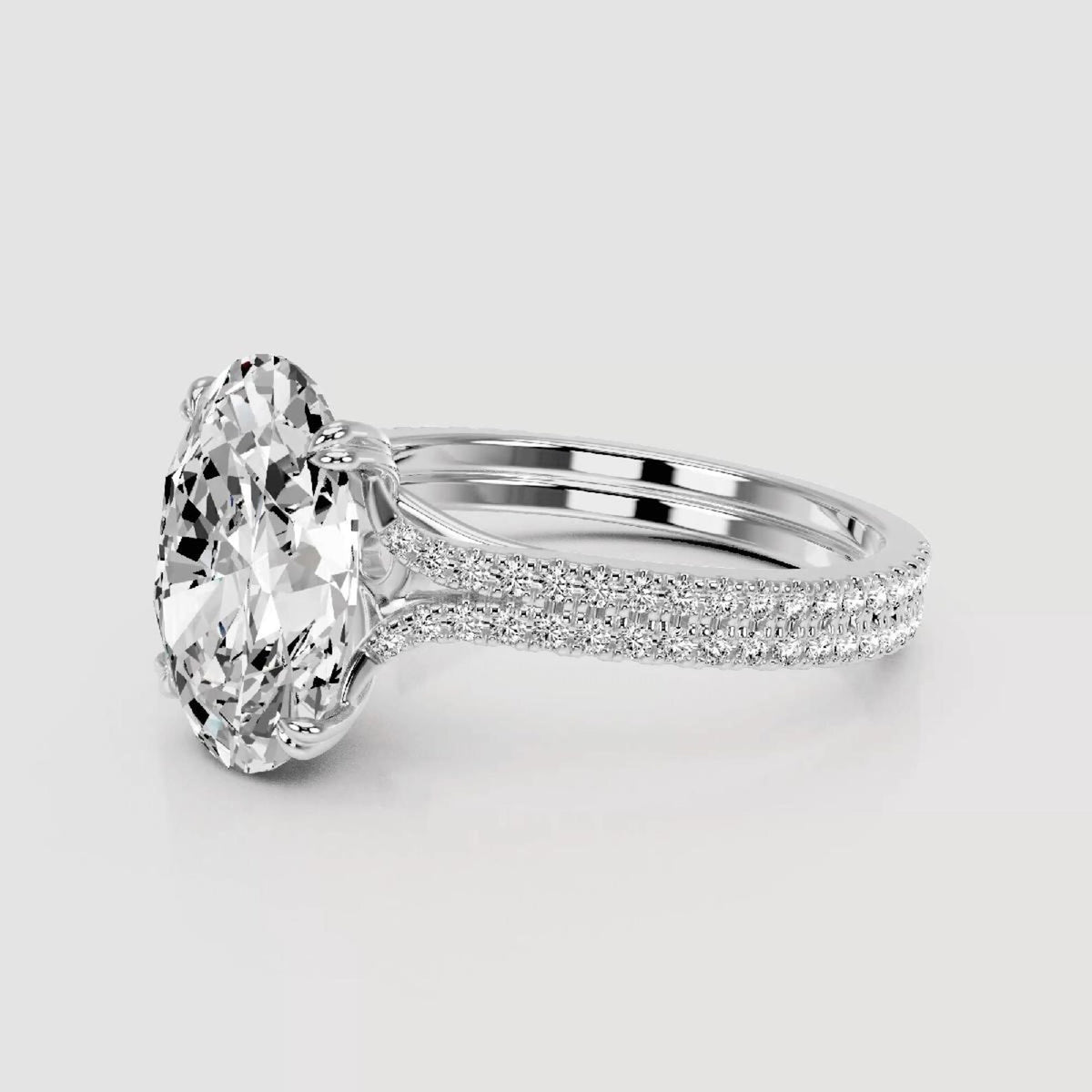 Angle view of 4 Carat Oval Cut Lab Grown Diamond Ring featuring double row pavé setting in White Gold