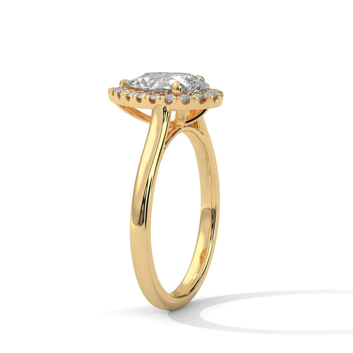 Perspective angle view of 3 Carat Pear Cut Lab Diamond Halo Engagement Ring in Yellow Gold