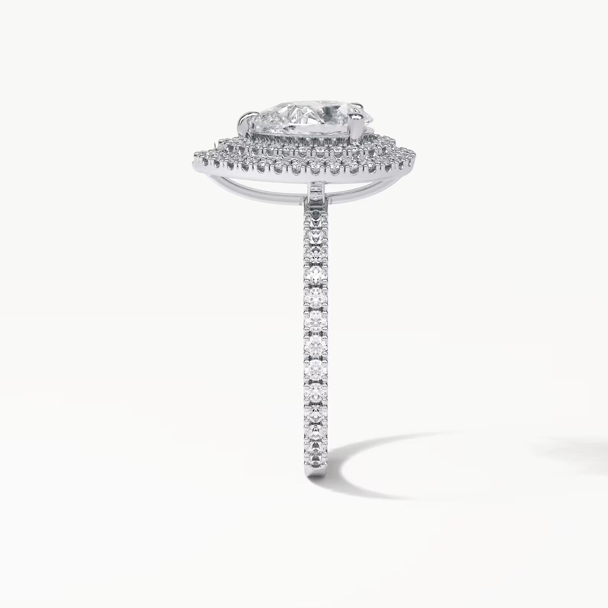 Side profile view of 2 Carat Pear Cut Lab Grown Diamond Double Halo Ring showing head structure and pavé shank
