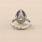 Underside structural view of 4 Carat Pear Cut Lab Grown Diamond Ring showing under-halo gallery and interior band structure