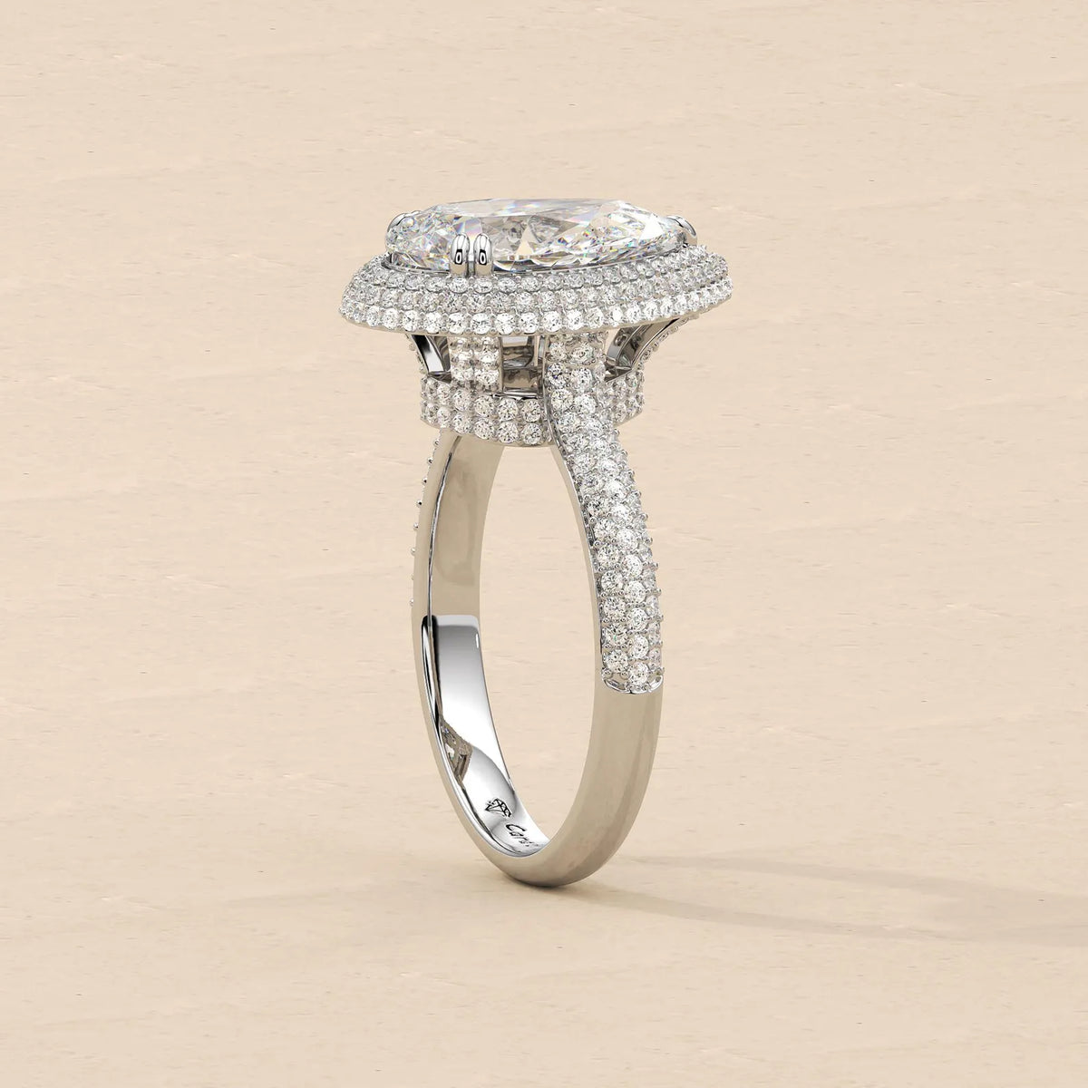 Standing upright perspective view showing high-profile cathedral basket setting of 4 Carat Pear Lab Diamond Double Halo Ring