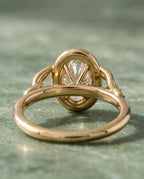 Rear view showing oval basket setting and interior band design of 2 Carat Oval Lab Diamond Botanical Ring in yellow gold