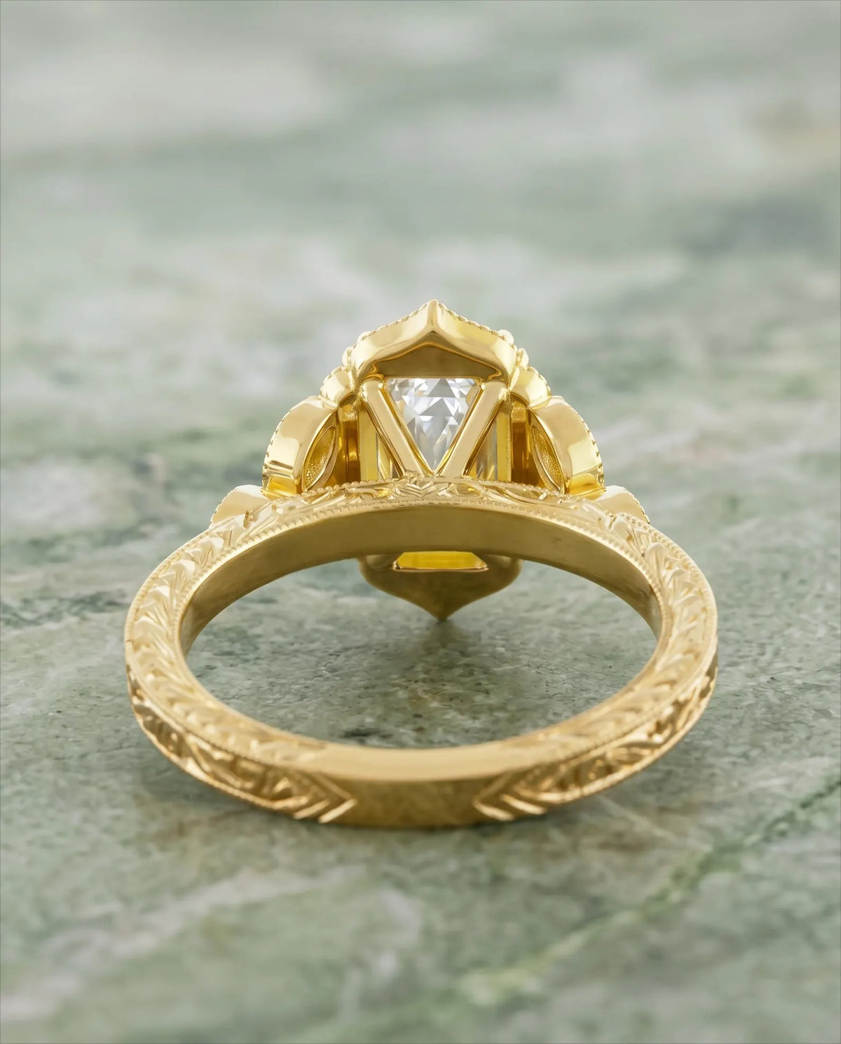 Underside profile view showing basket geometry and engraved band pattern of 3 Carat Emerald Cut Lab Diamond Vintage Ring