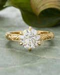 Top-down view of 3 Carat Round Cut Lab Grown Diamond Engagement Ring showing 6-prong crown setting and engraved yellow gold shoulders