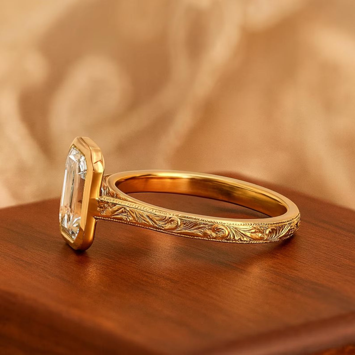 Direct side profile view of 3 Carat Emerald Cut Lab Grown Diamond Ring showing hand-engraved scrollwork band in yellow gold