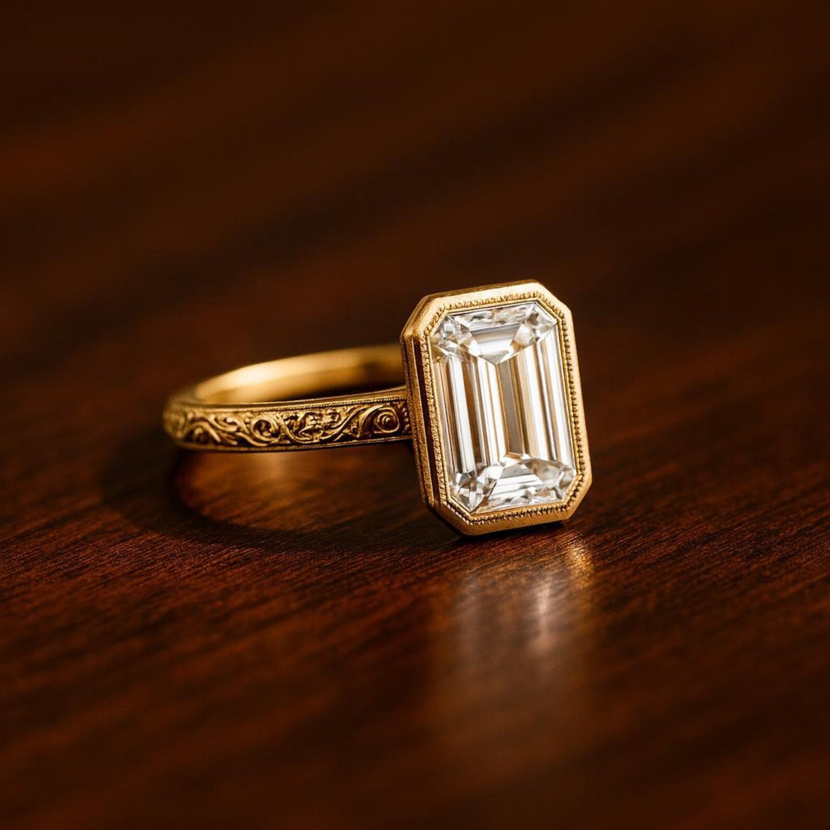 Close-up view of 3 Carat Emerald Cut Lab Grown Diamond showing step-cut facets and milgrain inner bezel border
