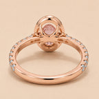Underside view of 2 Carat Pink Oval Cut Lab Diamond Ring showing open bridge basket and rose gold pave band