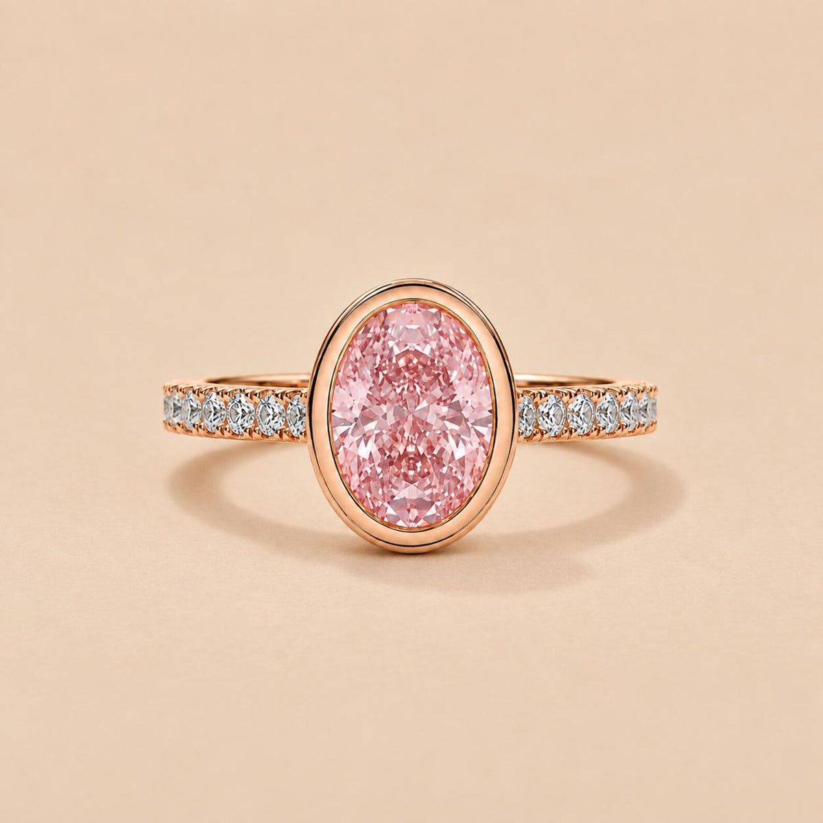 Top-down front view of 2 Carat Pink Oval Cut Lab Grown Diamond Bezel Ring with pave diamond band
