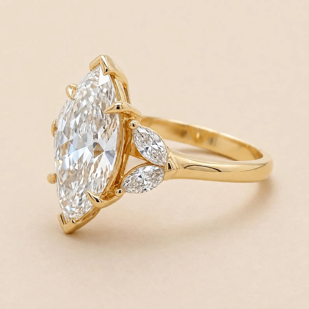 Detailed profile view showing 4 Carat Marquise Cut Lab Diamond with V-prong setting and marquise side cluster accents