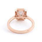 Underside openwork setting detail of 3 Carat Emerald Cut Lab Diamond Ring in rose gold