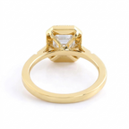 Underside view of yellow gold gallery basket for 3 Carat Emerald Cut Lab Diamond Engagement Ring