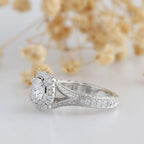 Side angled view of 3 Carat Round Cut Lab Grown Diamond vintage halo engagement ring with split shank and milgrain edges