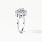 Three-quarter vertical perspective of a 3 CT lab diamond engagement ring with a high floral gallery and smooth metal band.