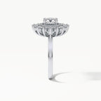 Profile view of a 3 carat round lab grown diamond engagement ring with a sunburst double halo and wirework gallery.