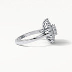 Low angle side shot highlighting the dual-layer halo structure and polished band of a 3 carat lab diamond ring.