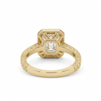 Bottom view revealing the openwork under-gallery basket and continuous engraved pattern on the yellow gold band.