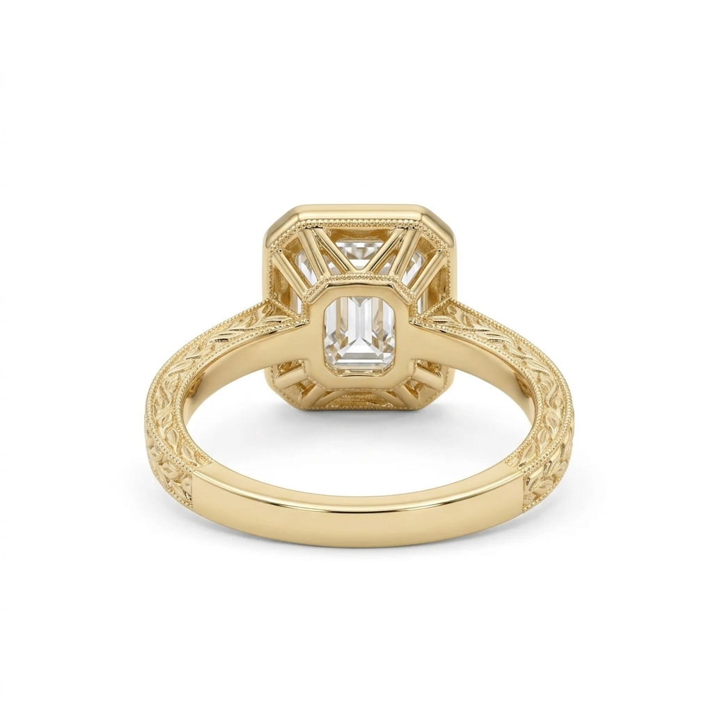 Bottom view revealing the openwork under-gallery basket and continuous engraved pattern on the yellow gold band.