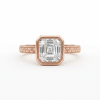 Direct top view of a 3 carat Asscher cut lab grown diamond set in a rose gold bezel frame with vintage leaf engraved band.
