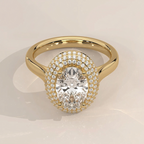 High angle view of a 3 CT oval lab grown diamond engagement ring with a dramatic triple micro-pave halo set in polished 14K yellow gold.