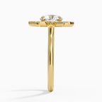 Side view profile of a 3 CT round lab grown diamond engagement ring with a flat sunflower petal halo on a thin yellow gold band.