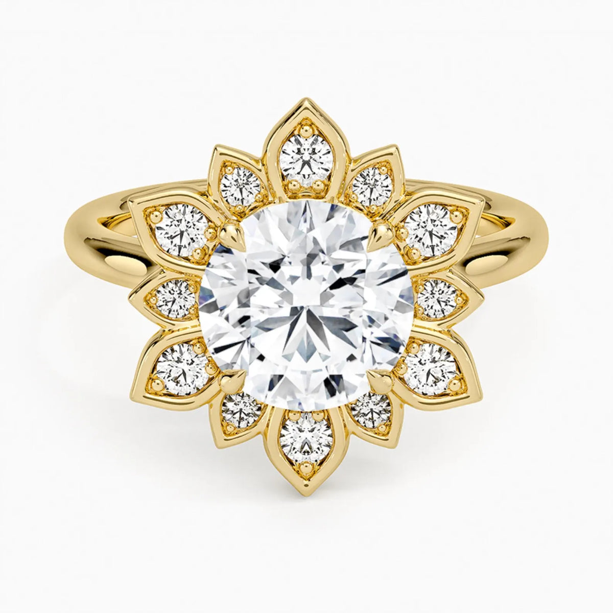 Top-down view of a 3 carat round cut lab grown diamond surrounded by a pave-set sunflower petal halo in yellow gold.