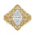 Direct overhead view of a 3 carat marquise cut lab grown diamond in a wide vintage scrollwork filigree frame.