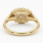 Bottom view of a 3 CT East-West marquise lab grown diamond ring showing the intricate filigree lattice undergallery in 14K yellow gold.