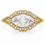 Direct overhead view of a 3 CT East-West marquise cut lab grown diamond set horizontally in a scalloped beaded pave diamond halo.