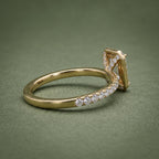 Three-Quarter View of Emerald Cut Lab Grown Diamond Ring Showing Pave Band