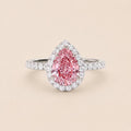 Front View of 3 CT Pink Pear Cut Lab Grown Diamond Halo Ring on Neutral Background