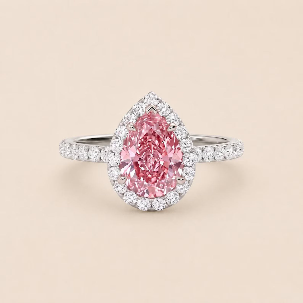 Front View of 3 CT Pink Pear Cut Lab Grown Diamond Halo Ring on Neutral Background