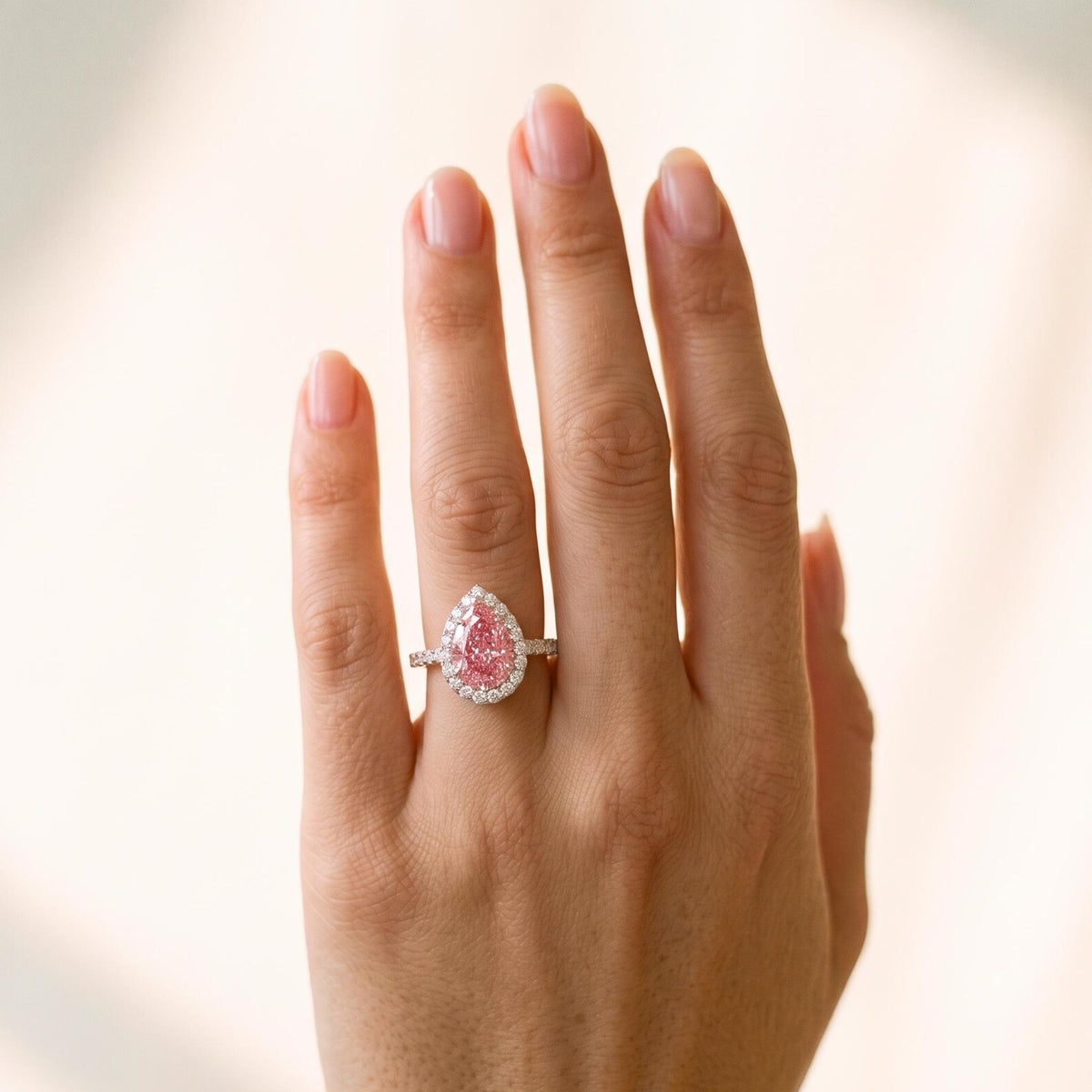3 Carat Pink Pear Cut Lab Grown Diamond Ring Worn on Finger