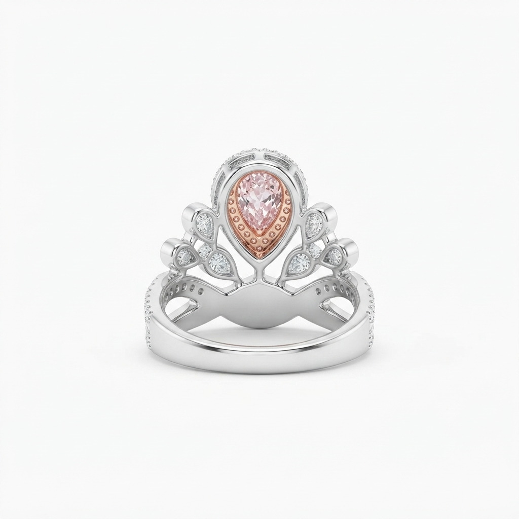Back view of a pink pear cut lab grown diamond tiara ring with intricate two-tone details and white accent stones.