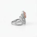 Side profile shot showcasing the height and crown design of the pink pear cut lab grown diamond ring.