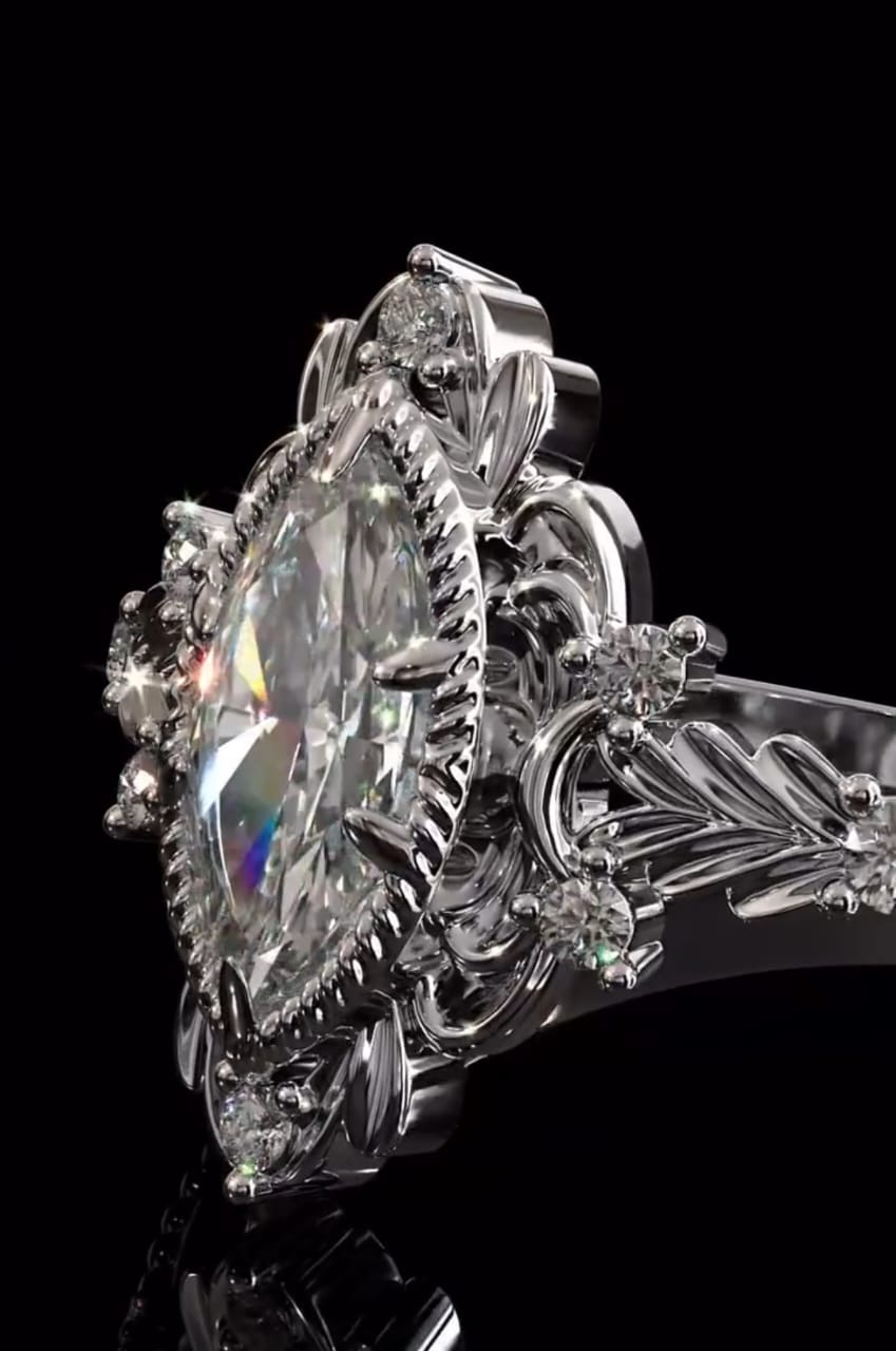 Side profile view of a 3 CT marquise lab grown diamond ring showing the raised floral gallery and beaded band.