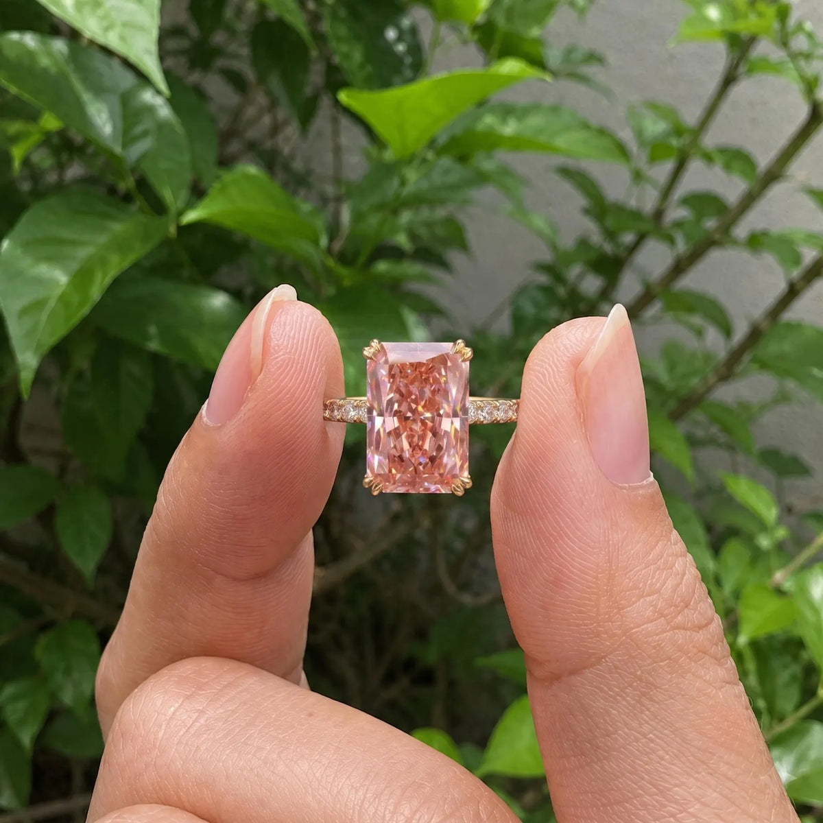holding-4-ct-pink-radiant-cut-lab-grown-diamond-ring-close-up