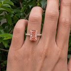 4-carat-pink-radiant-cut-diamond-ring-modeled-on-finger-outdoor-view
