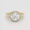 Top view of 3 CT round cut lab grown diamond triple band halo engagement ring in yellow gold.