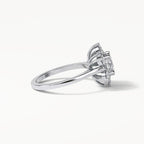 Silver ring with a diamond on a white background