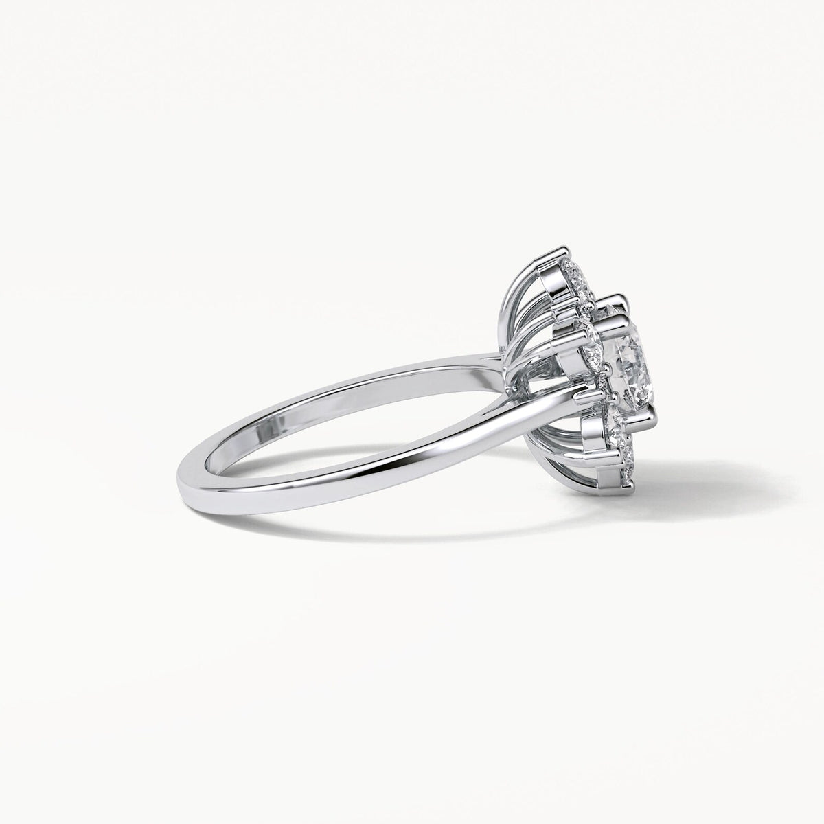 Silver ring with a diamond on a white background