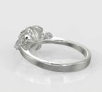 Underside side perspective view showing the smooth band and structural base of a sculpted rose lab diamond ring.