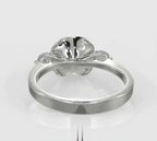 Direct bottom profile view displaying the polished band and sculpted bloom base of a rose engagement ring.